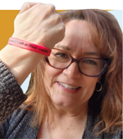 Woman wearing a GVHD Alliance bracelet